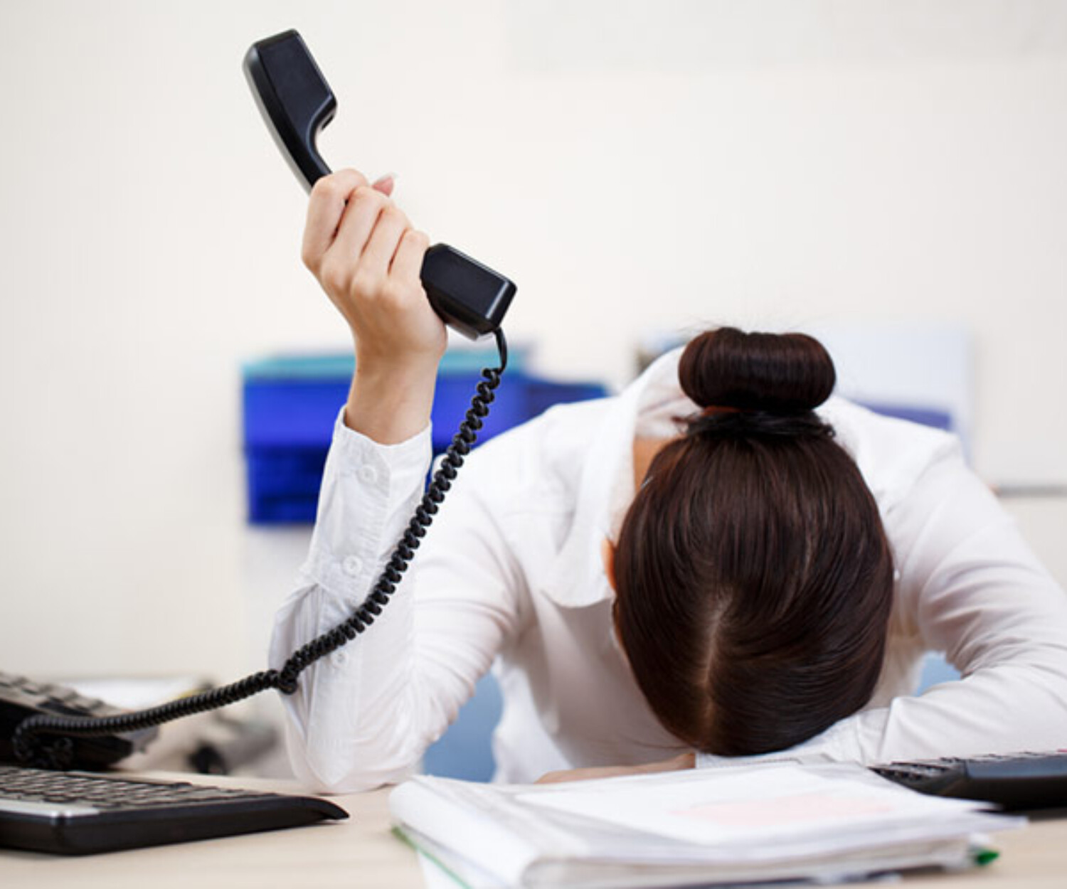 How-to-get-out-of-phone-call-hell-frustrated-woman-on-phone